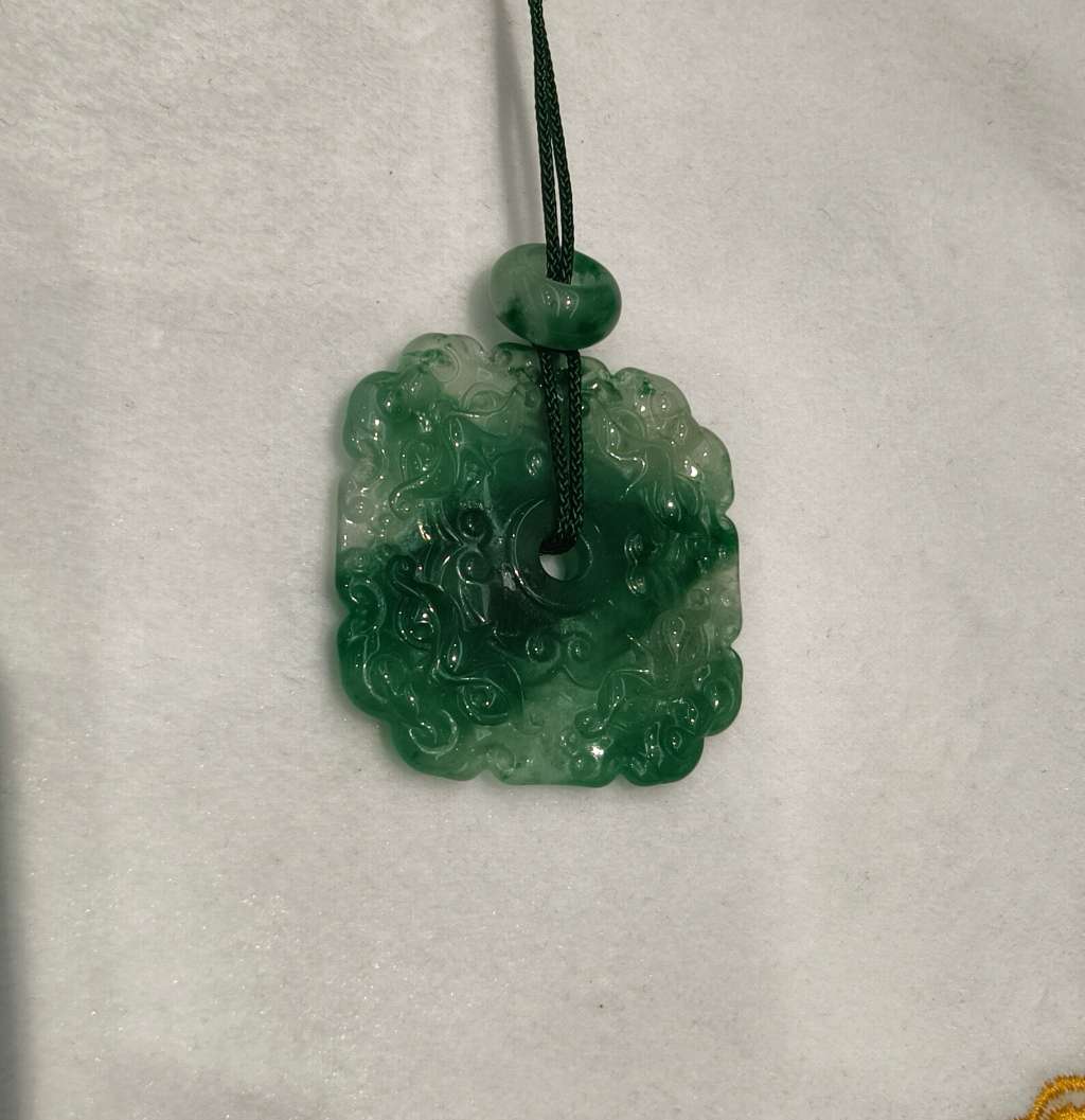 The jade pendant in the misty rain is made of natural jade from Africa, symbolizing wealth from all directions Application Scenario