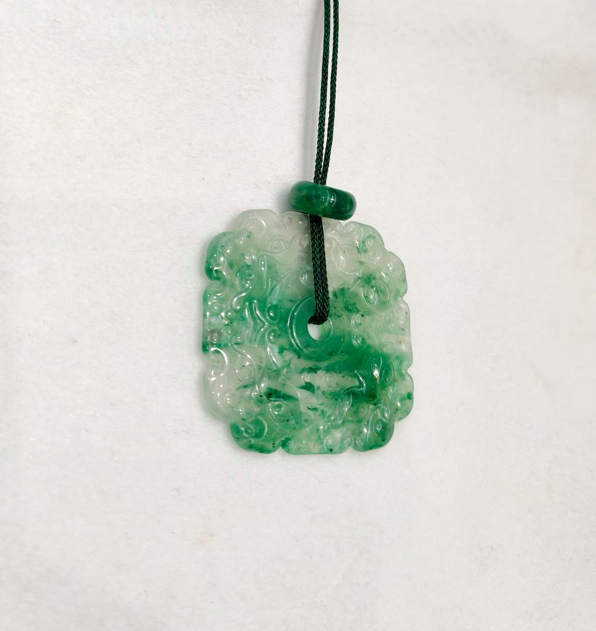 The jade pendant in the misty rain is made of natural jade from Africa, symbolizing wealth from all directions detail image 6