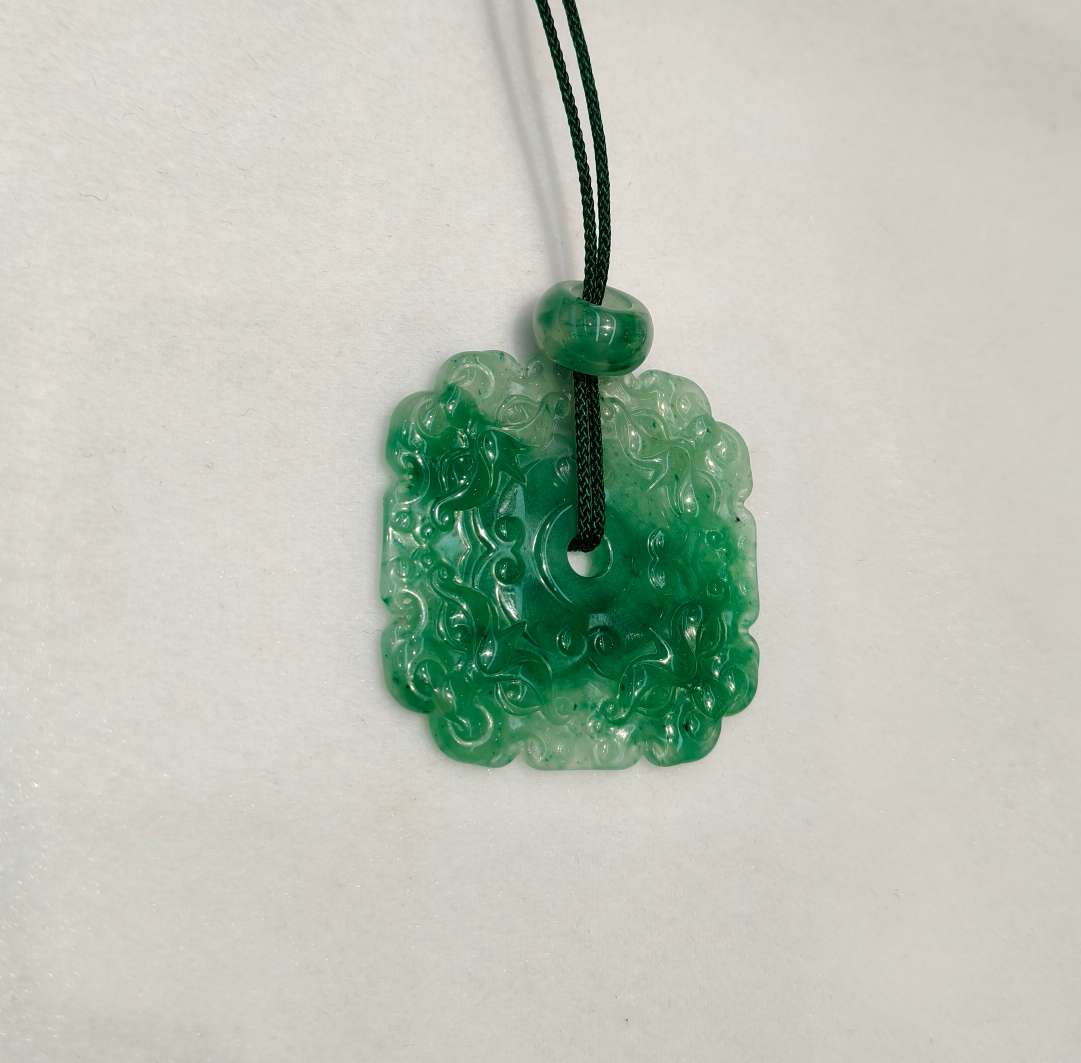 The jade pendant in the misty rain is made of natural jade from Africa, symbolizing wealth from all directions detail image 5