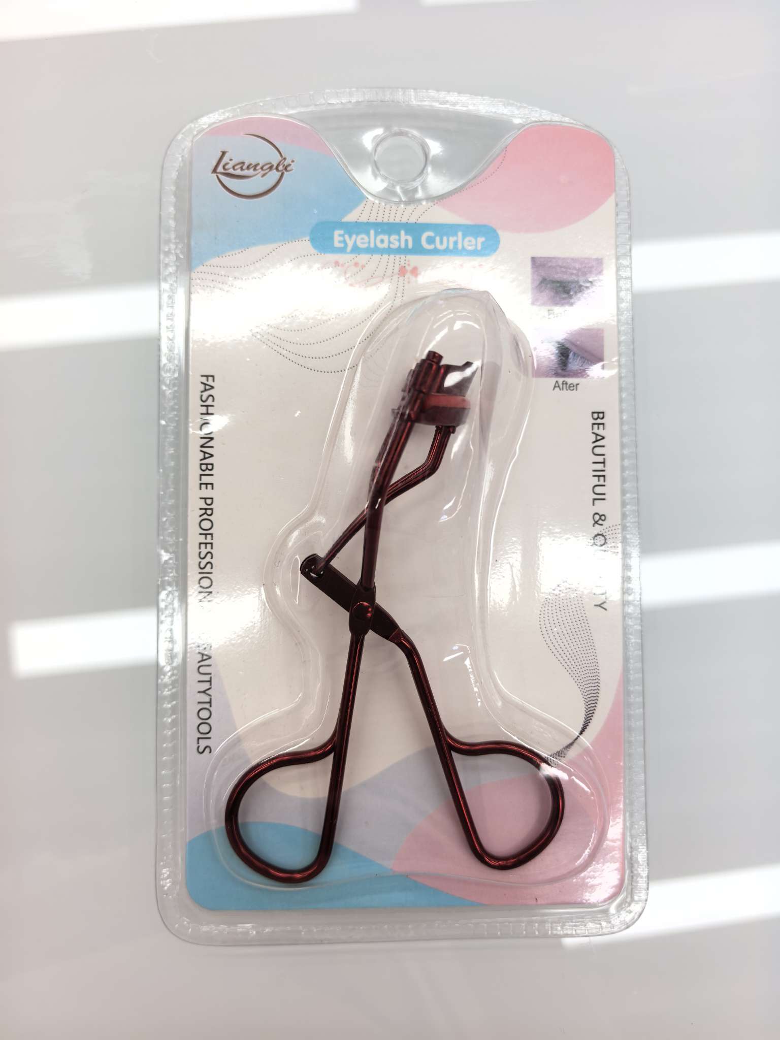 Colored iron-handled eyelash curler Item Picture