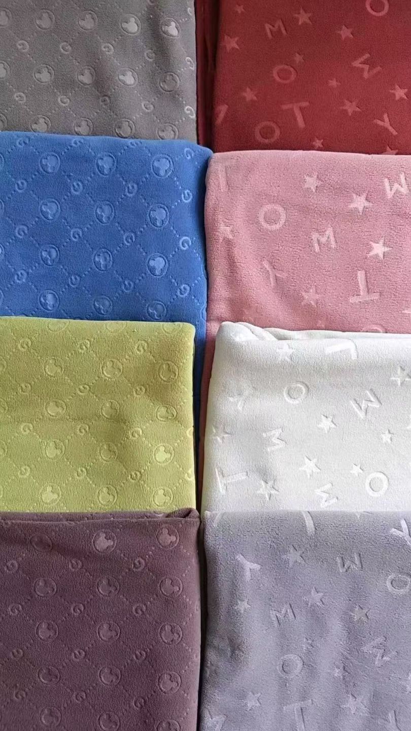 珊瑚绒双面珊瑚绒。珊瑚绒压花印花。珊瑚绒提花双面珊瑚绒。奥利绒提花压花。。双面奥粒绒。详情图13