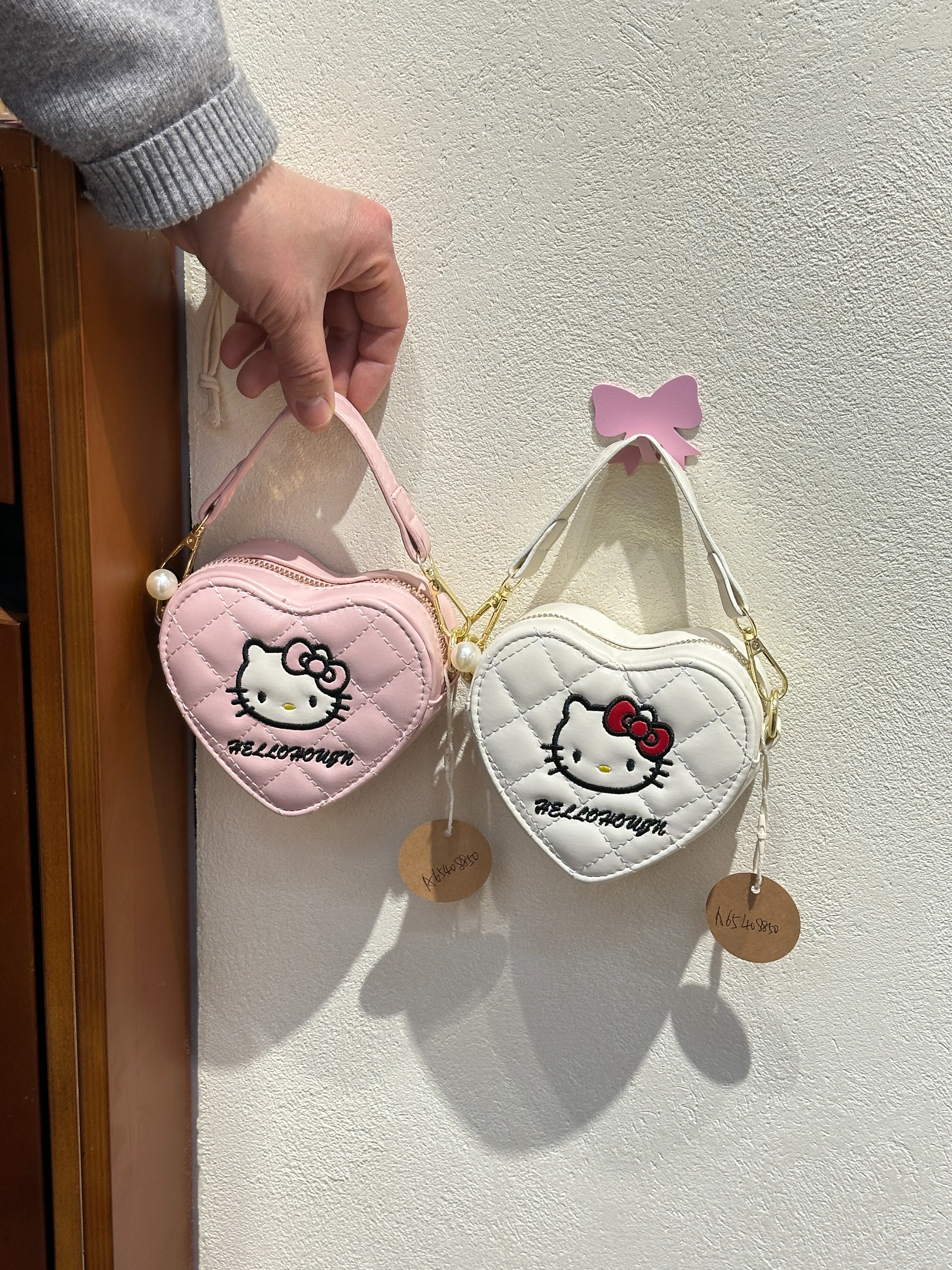 Hello Kitty心形小包包可爱时尚通勤包女生韩版潮流简约设计感