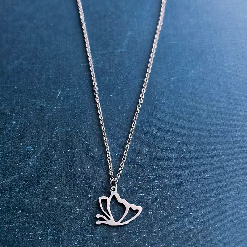 Cross-border foreign trade titanium steel and stainless steel creative hollowed-out animal butterfly DIY jewelry accessories, bracelets, pendants and pendants trend detail image 3