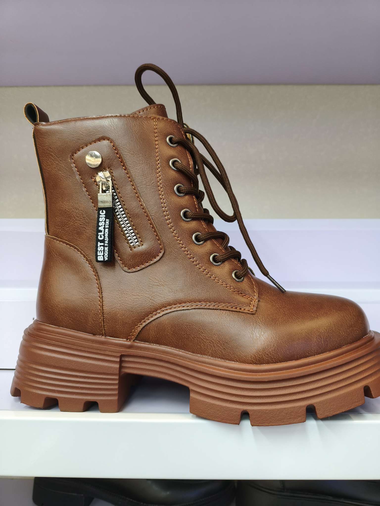 Thick-soled British-style Dr. Martens boots and black ankle boots details Picture