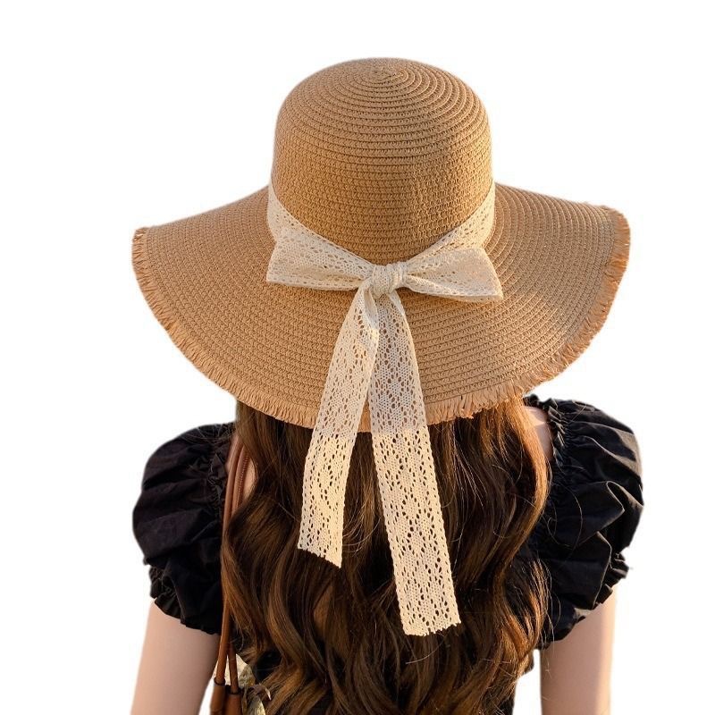 Summer new ladies' lace bow wide-brimmed straw hat, straw woven sun protection hat, fringed fringe beach hat, seaside vacation, travel, outdoor leisure sun hat, beach sun hat Item Picture