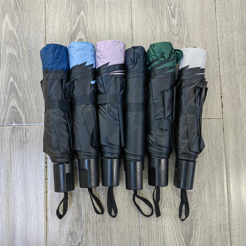 Hengdun manual folding basic model umbrella black rubber sun protection and shade umbrella manufacturer in stock, three-fold black rubber weather umbrella, solid color folding umbrella, advertising gift umbrella, customizable LOGO wholesale