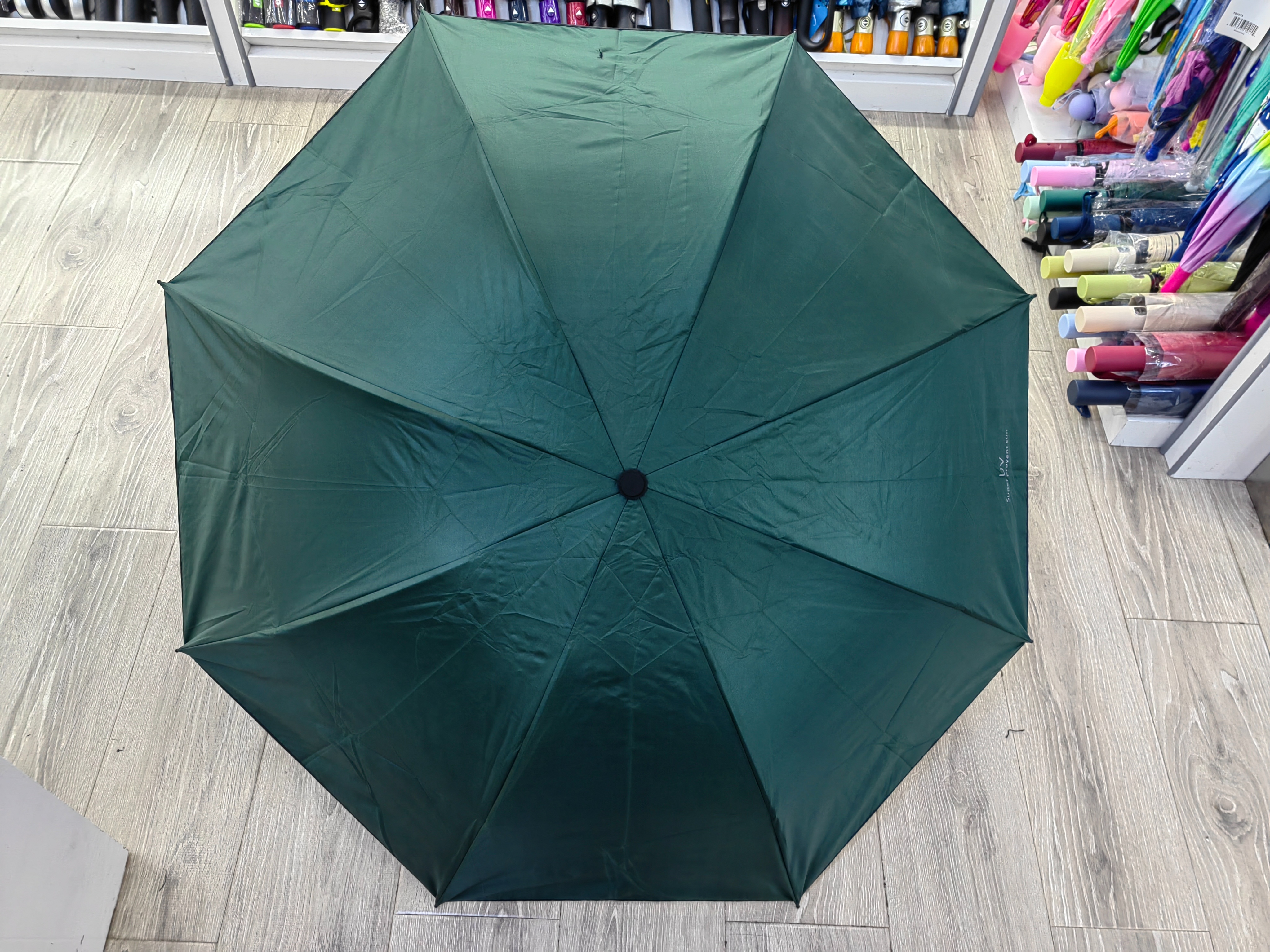 Hengdun manual folding basic model umbrella black rubber sun protection and shade umbrella manufacturer in stock, three-fold black rubber weather umbrella, solid color folding umbrella, advertising gift umbrella, customizable LOGO wholesale pic 3