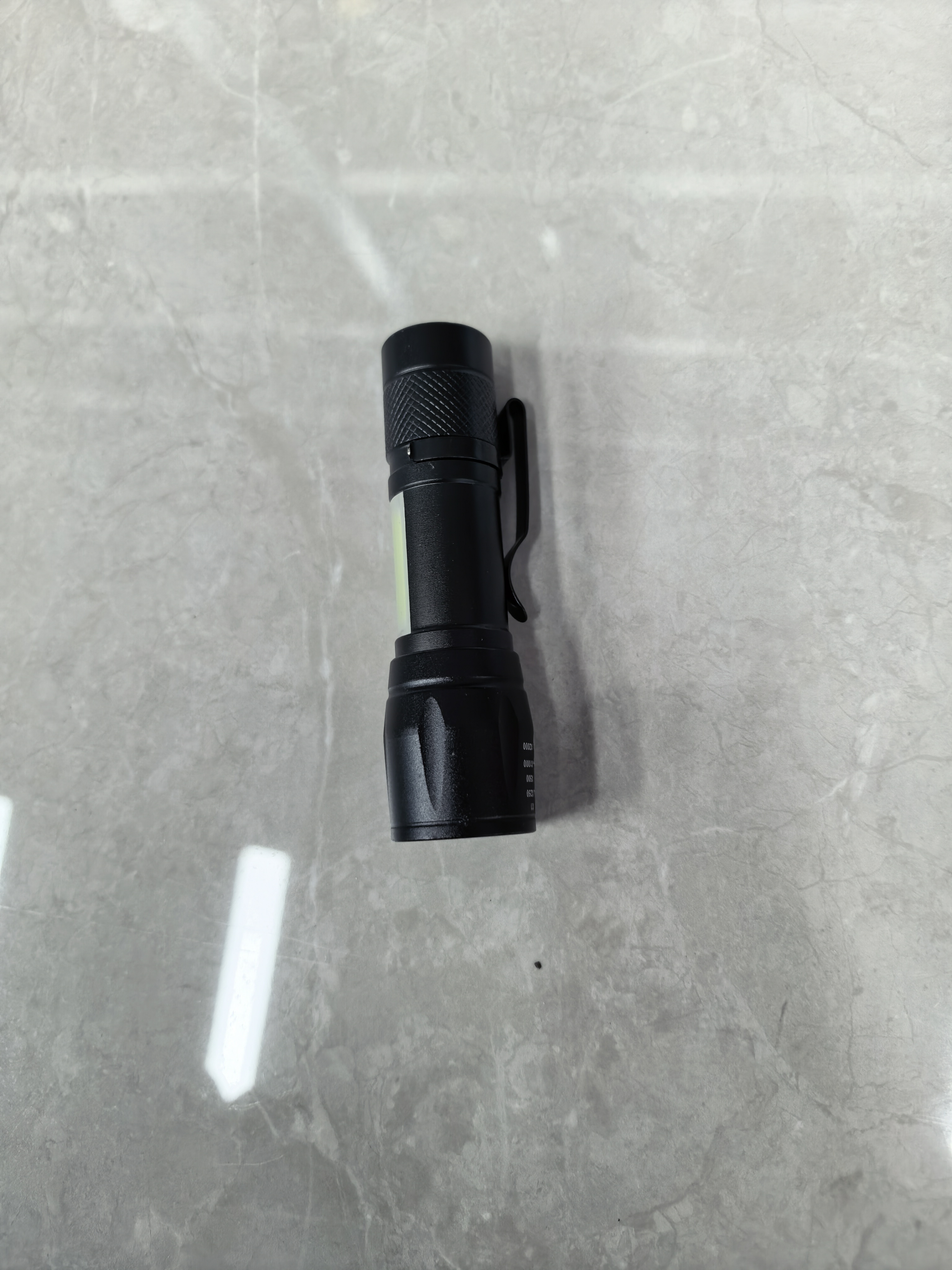 A small flashlight with built-in battery charging Specification image