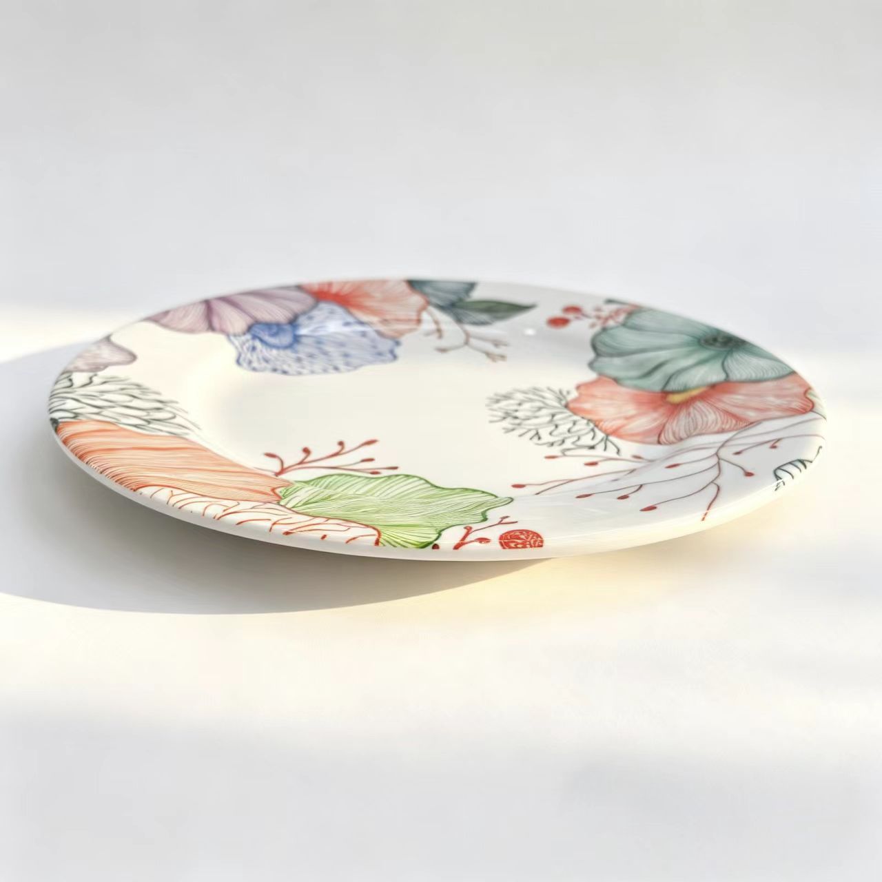 Melamine tableware is in stock and available for wholesale. Floral pattern imitation porcelain tableware and round shallow flat plates can be sold by the ton details Picture