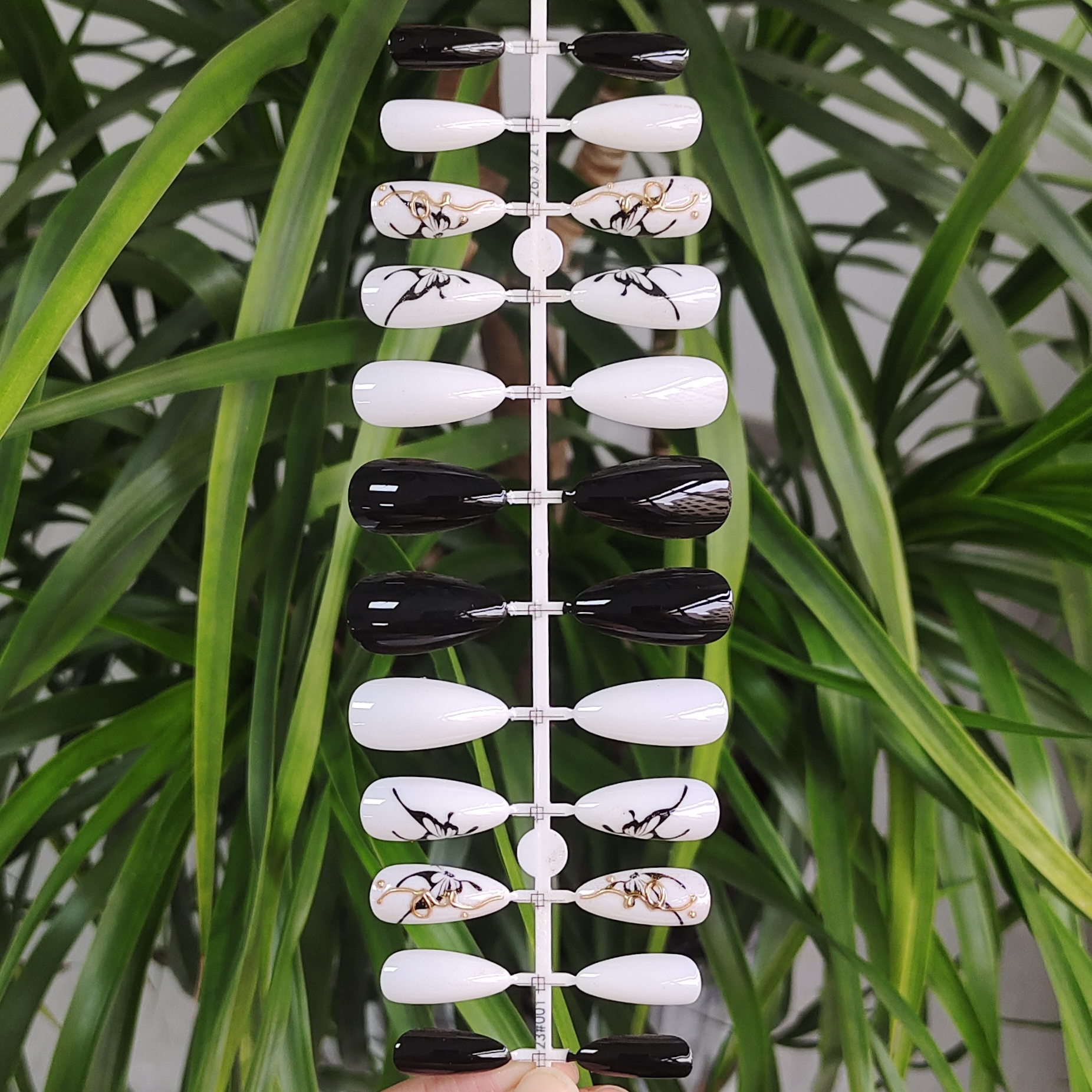 24 PCS PRESS ON NAIL TIPS ALMOND SHAPE 3D ADHESIVE DESIGN WITH BLACK AND WHITE COLOR AND BUTTERFLY PATTERN full figure