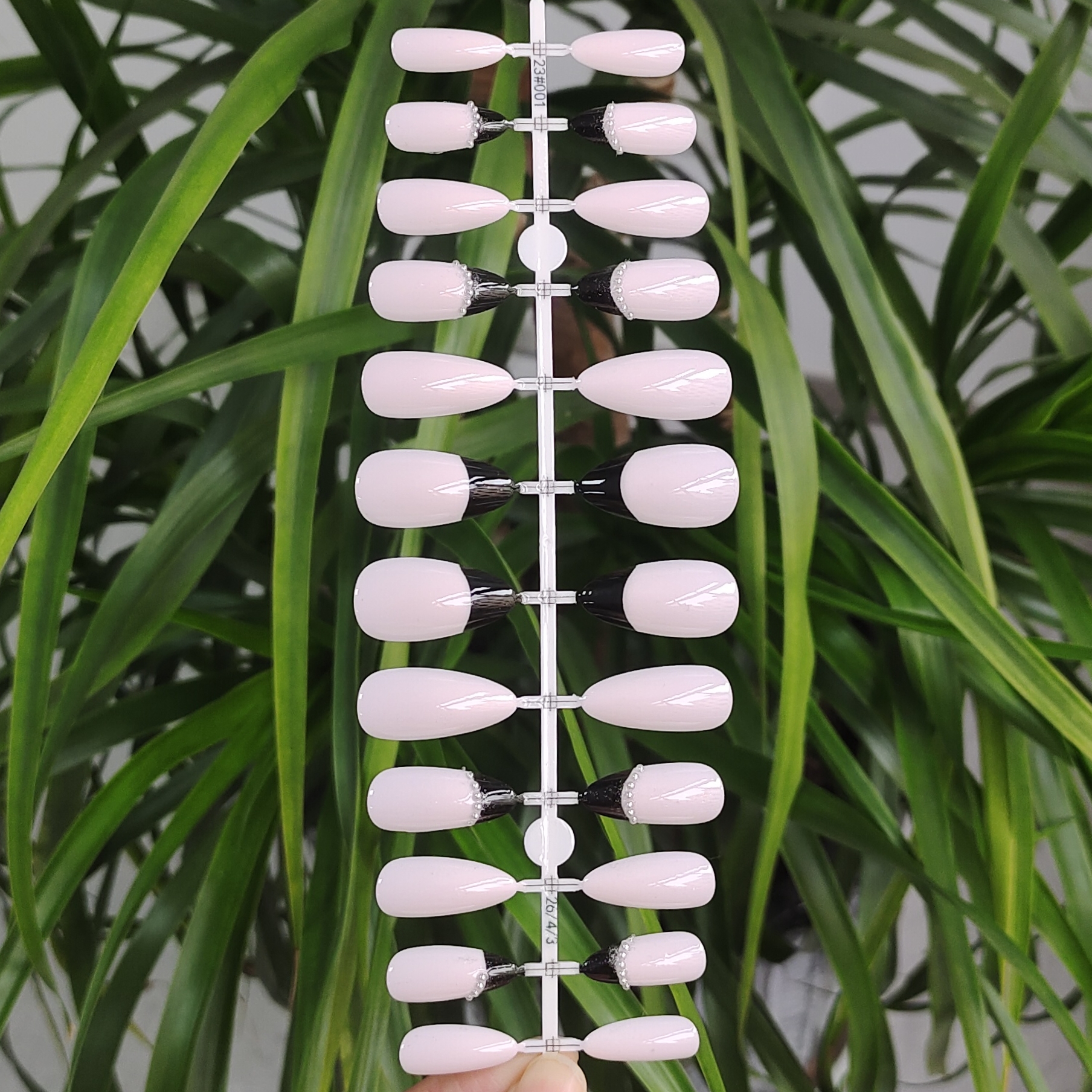 24 PCS PRESS ON NAIL TIPS ALMOND SHAPE 3D ADHESIVE DESIGN WITH PINK BASE COLOR AND BLACK FRENCH STYLE  full figure
