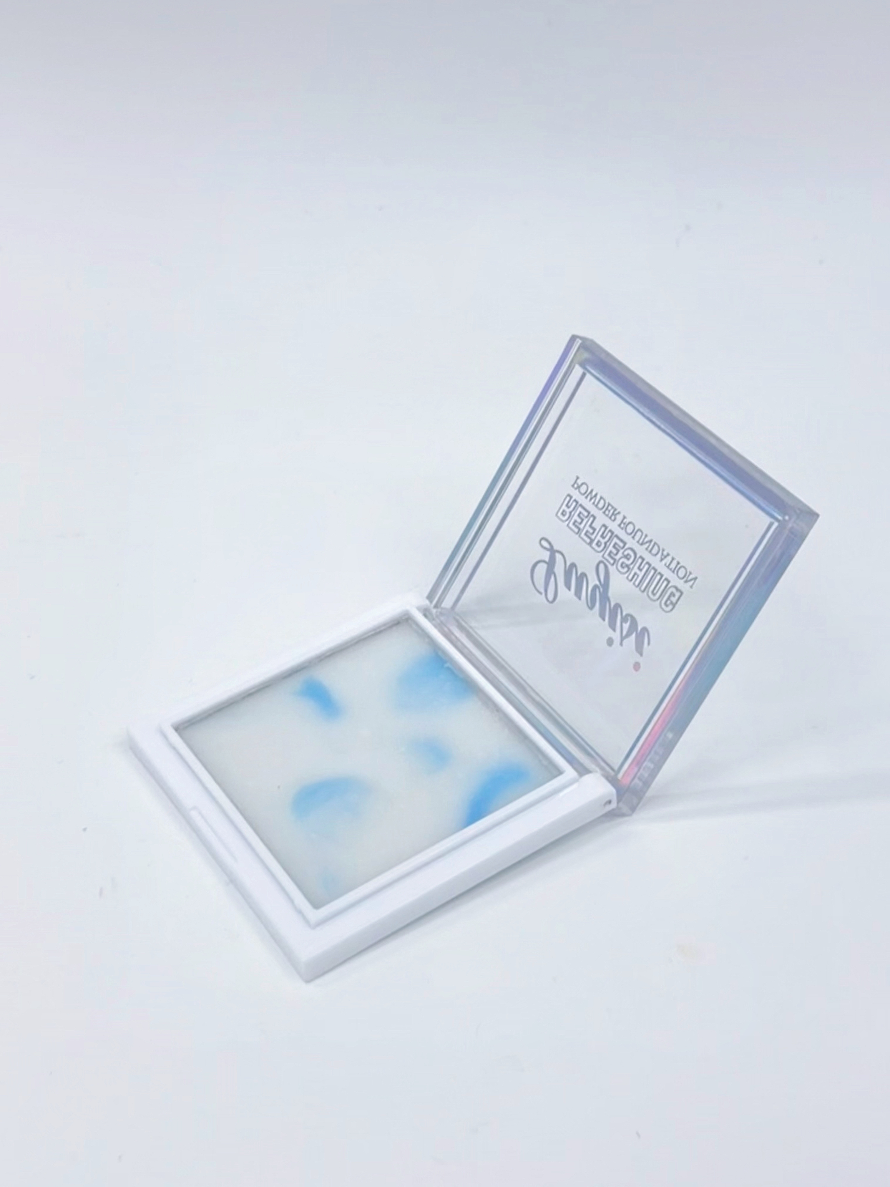 Cross-border IHUDABEAUTYI powder-free setting cool powder compact with fine powder texture, professional makeup export Application Scenario