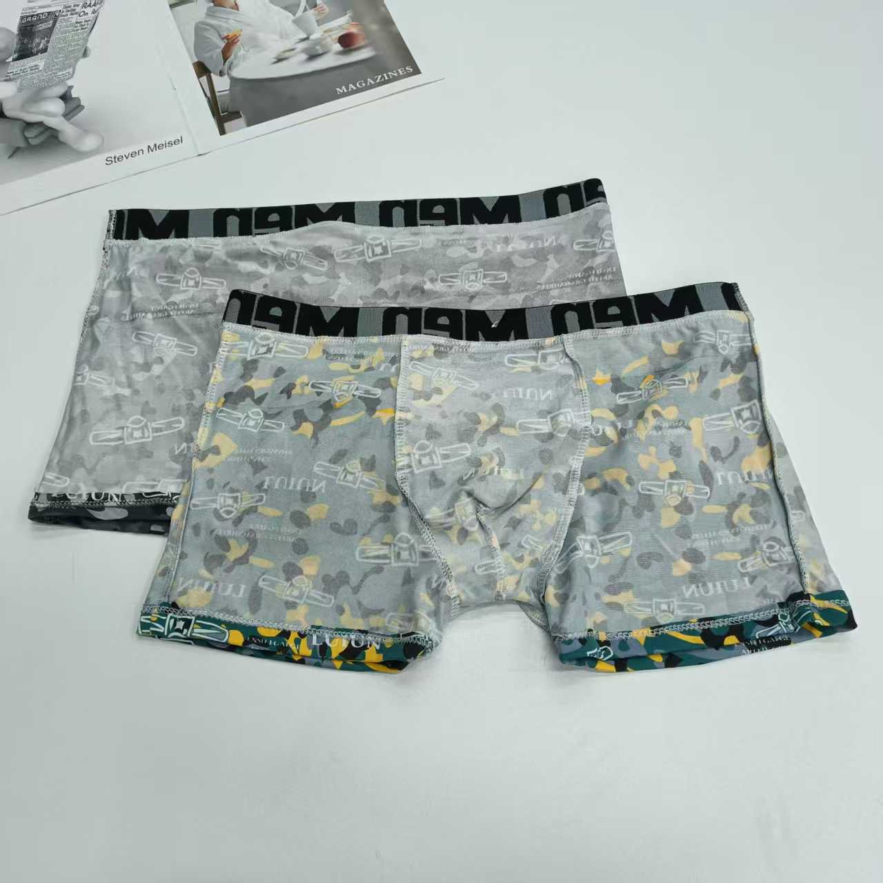 DD-0119-# 36-head men's underwear for export to the Middle East and Africa. Men's briefs are comfortable and breathable. Milk silk jacquard waist and printed briefs. Men's briefs QNI Application Scenario