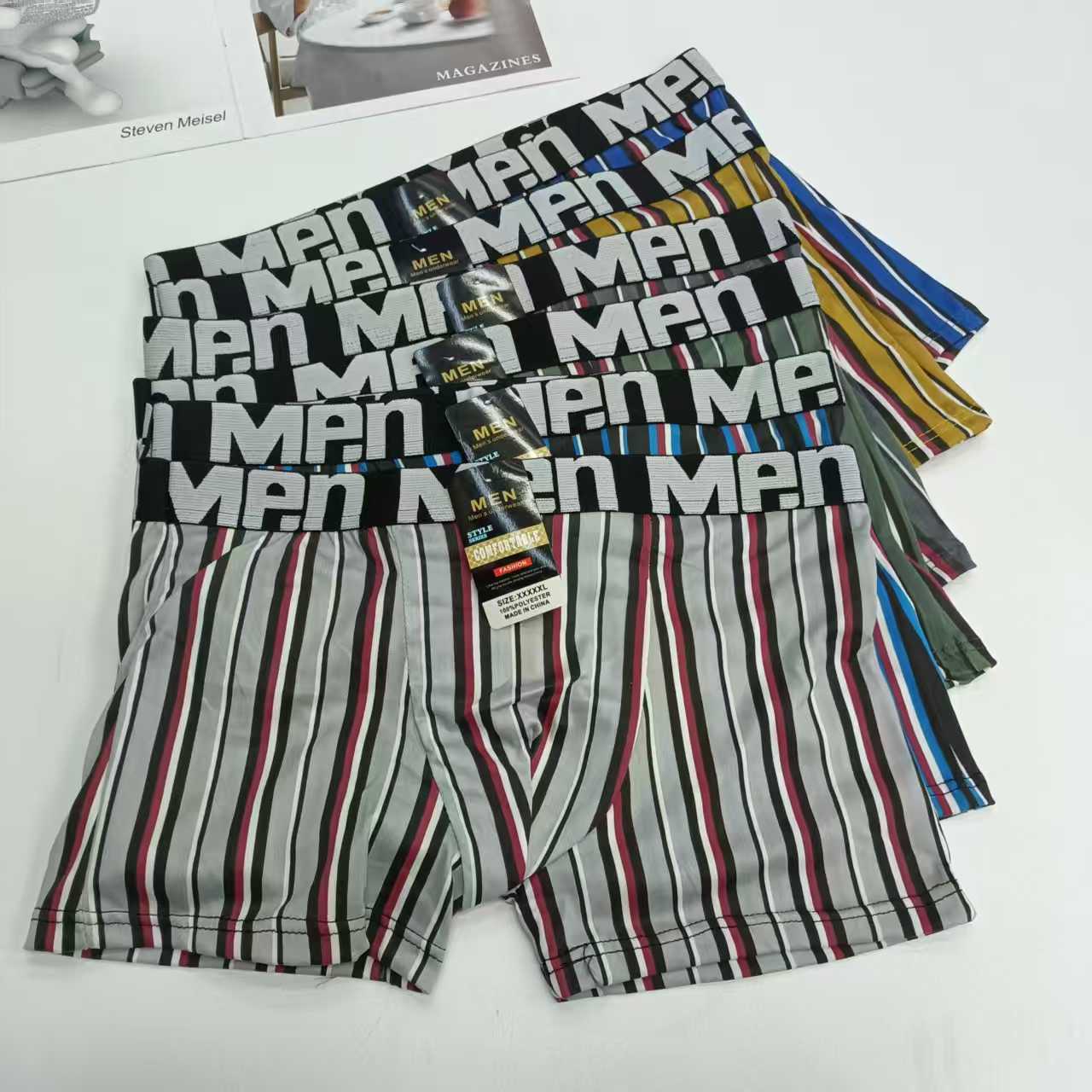 DD-0067# 36-head men's underwear for export to the Middle East and Africa. Men's briefs are comfortable and breathable. Milk silk jacquard waist and printed briefs. Men's briefs QNI details Picture