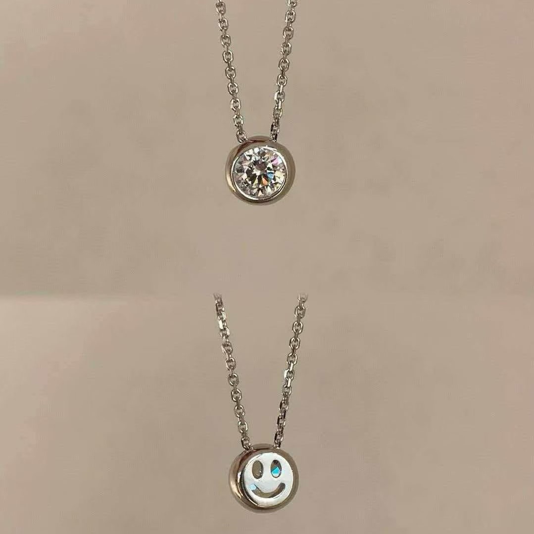 The new silver jewelry diamond-encrusted smiling face necklace exudes a high-end and unique charm