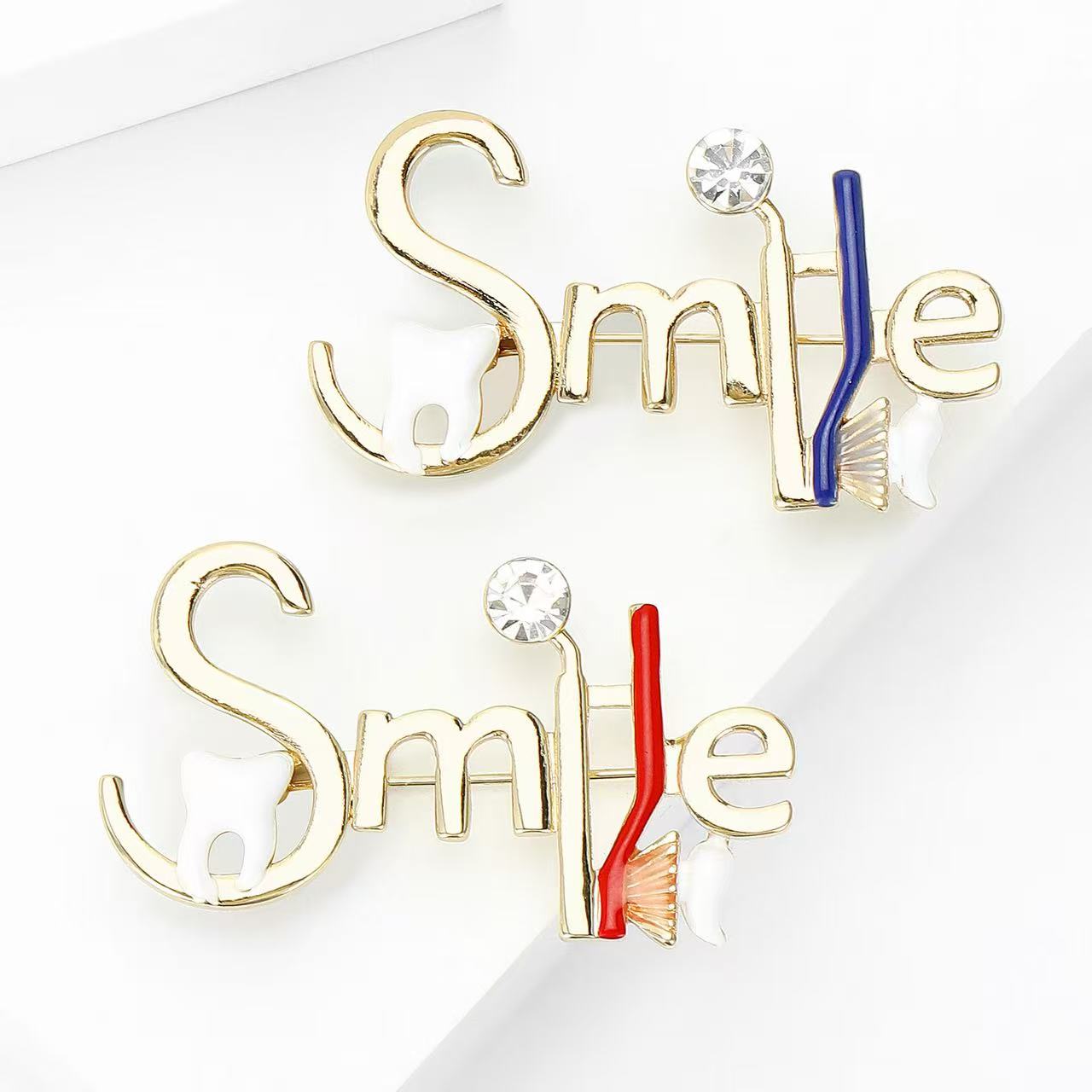 Smile letter brooch, decorated with a bar oil drip emblem, pin, tassel and chain