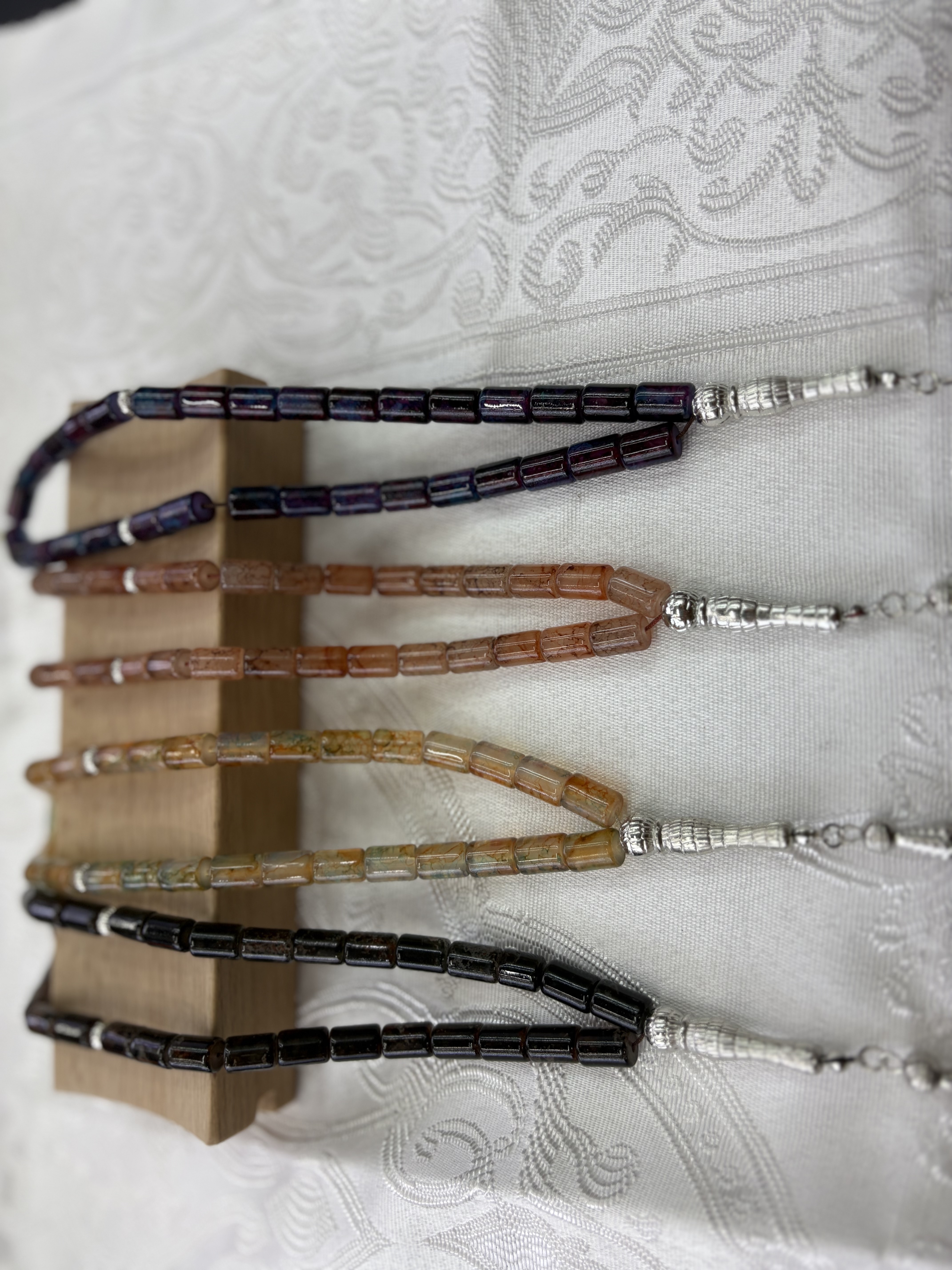 tasbinh offers a variety of custom styles of prayer beads and Buddhist prayer beads, including green and red ones full figure