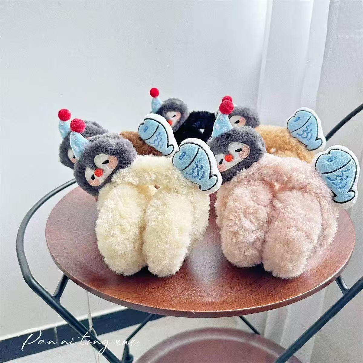 New autumn and winter cartoon penguin little fish ear muffs are warm and cute, providing students with windproof and cold-proof ear bags when going out details Picture