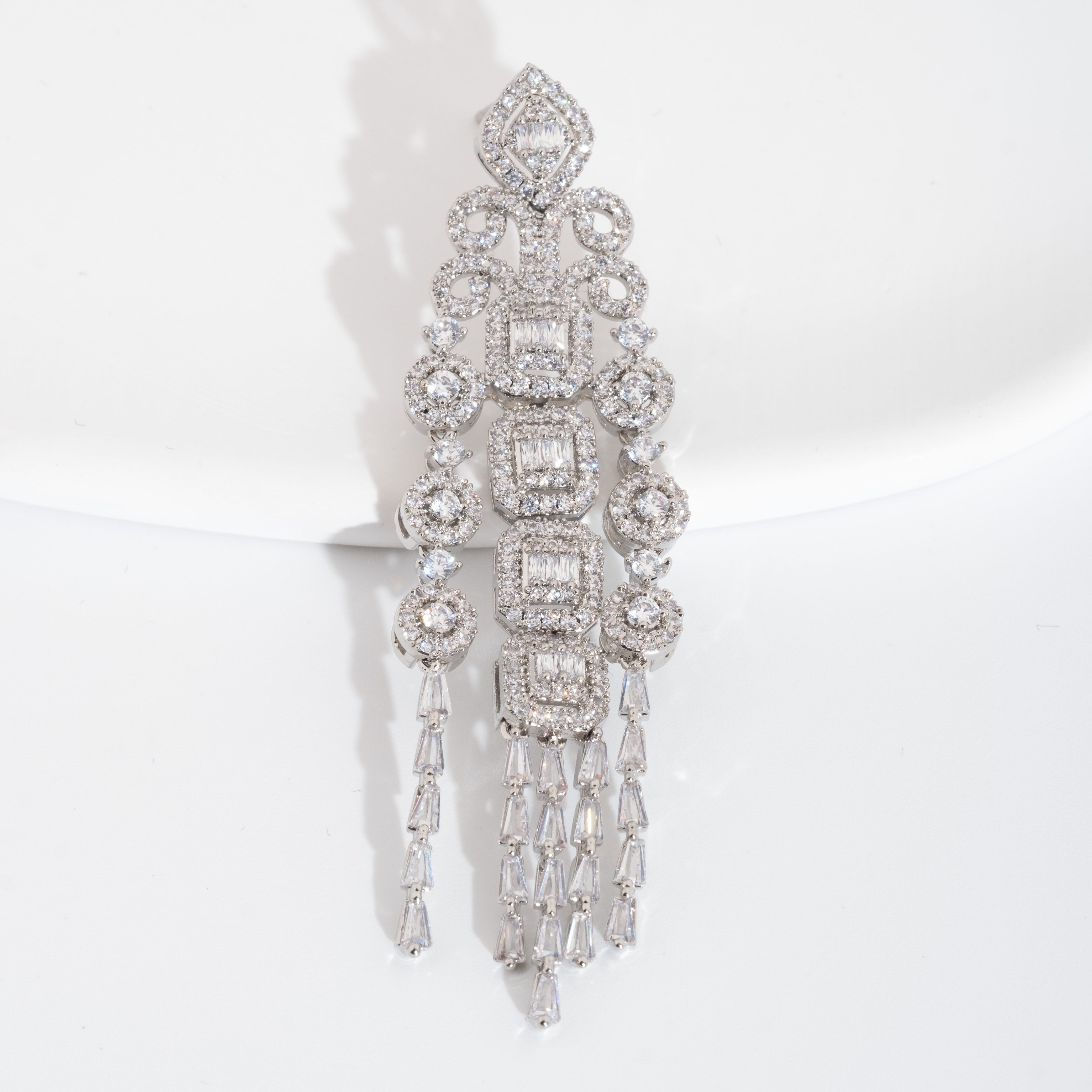 A set of luxurious and elegant earrings with a sparkling cubic zirconia pendant design is suitable for ladies to wear at weddings Application Scenario