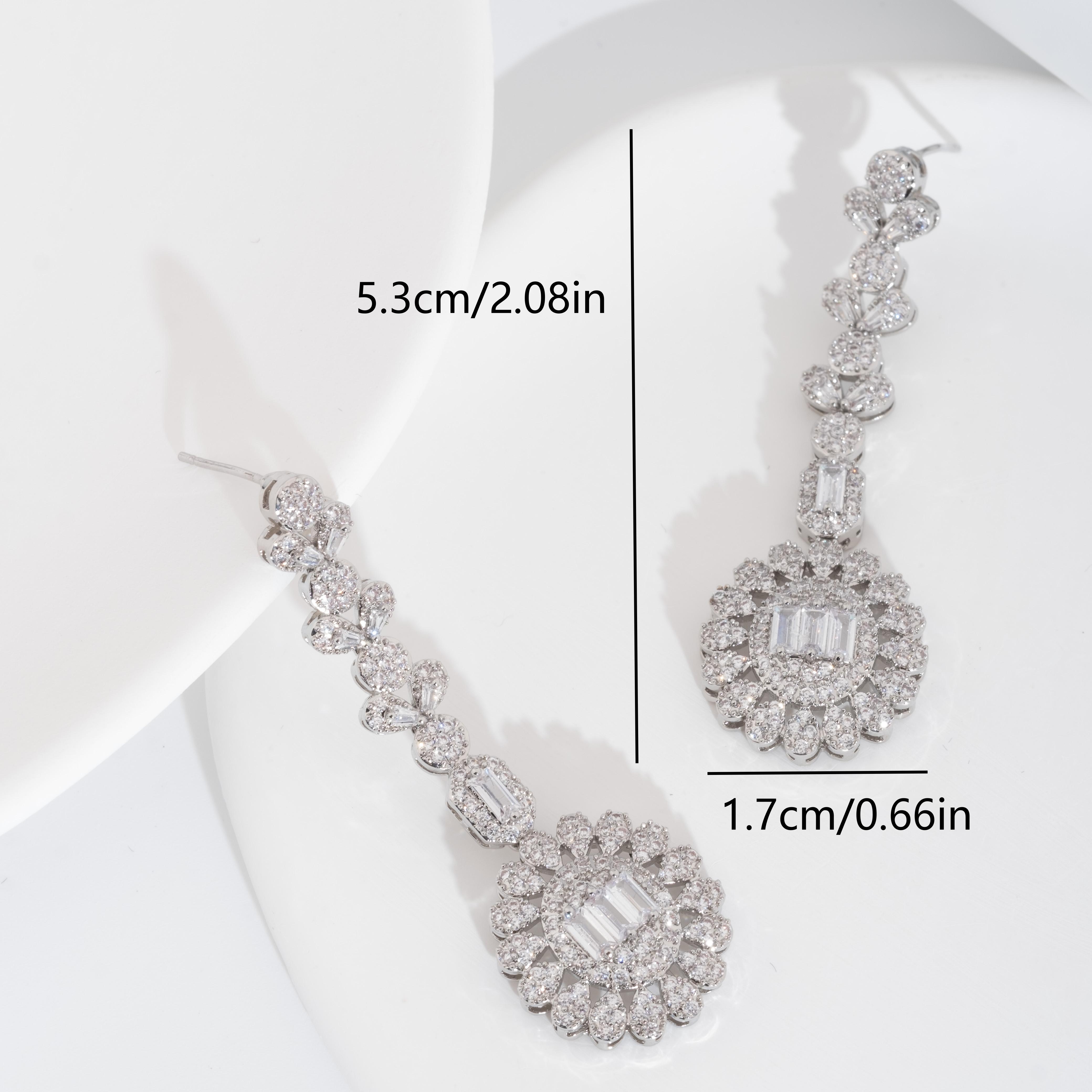 A set of luxurious and elegant earrings with a sparkling cubic zirconia sunflower design is suitable for ladies to wear at a wedding Item Picture