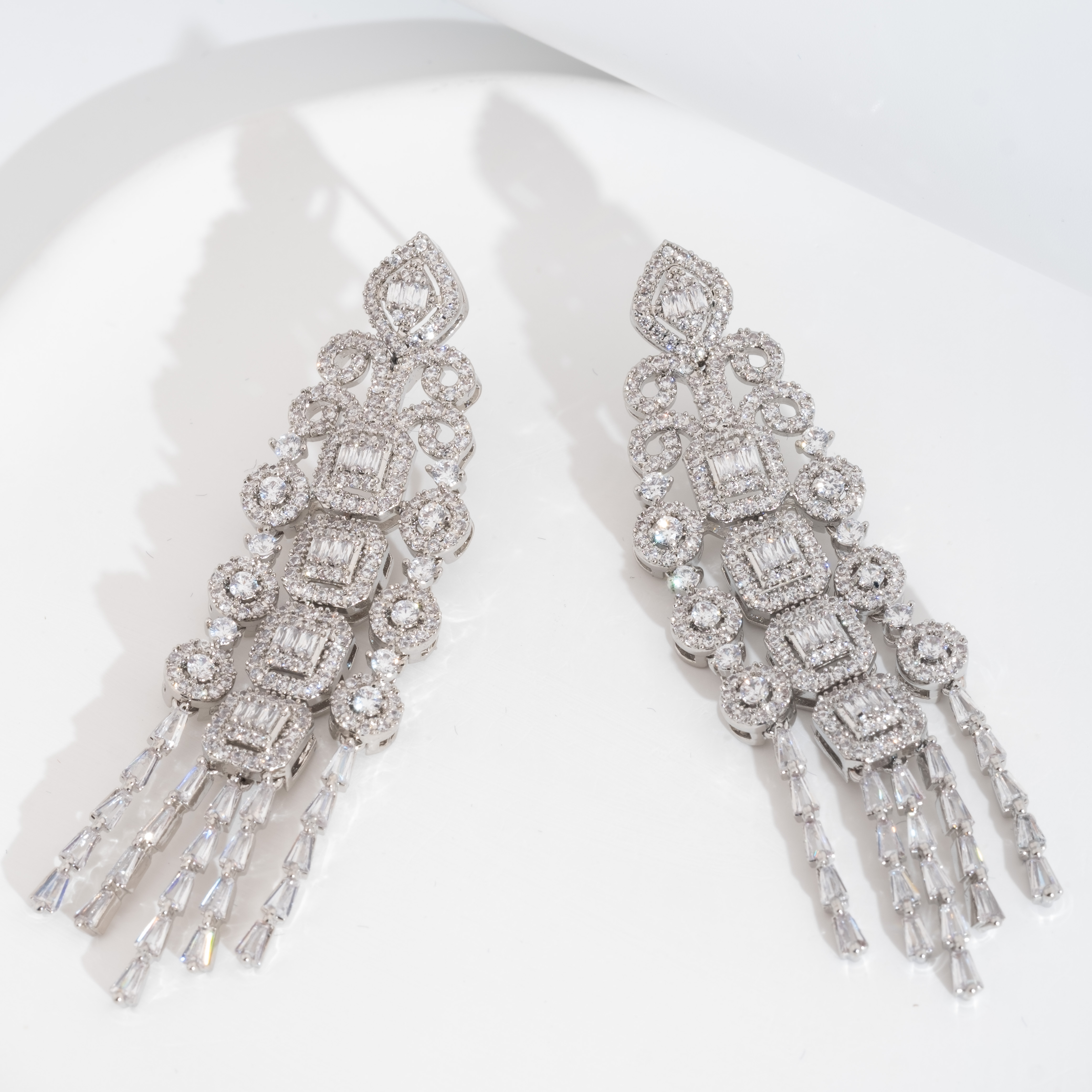 A set of luxurious and elegant earrings with a sparkling cubic zirconia pendant design is suitable for ladies to wear at weddings details Picture