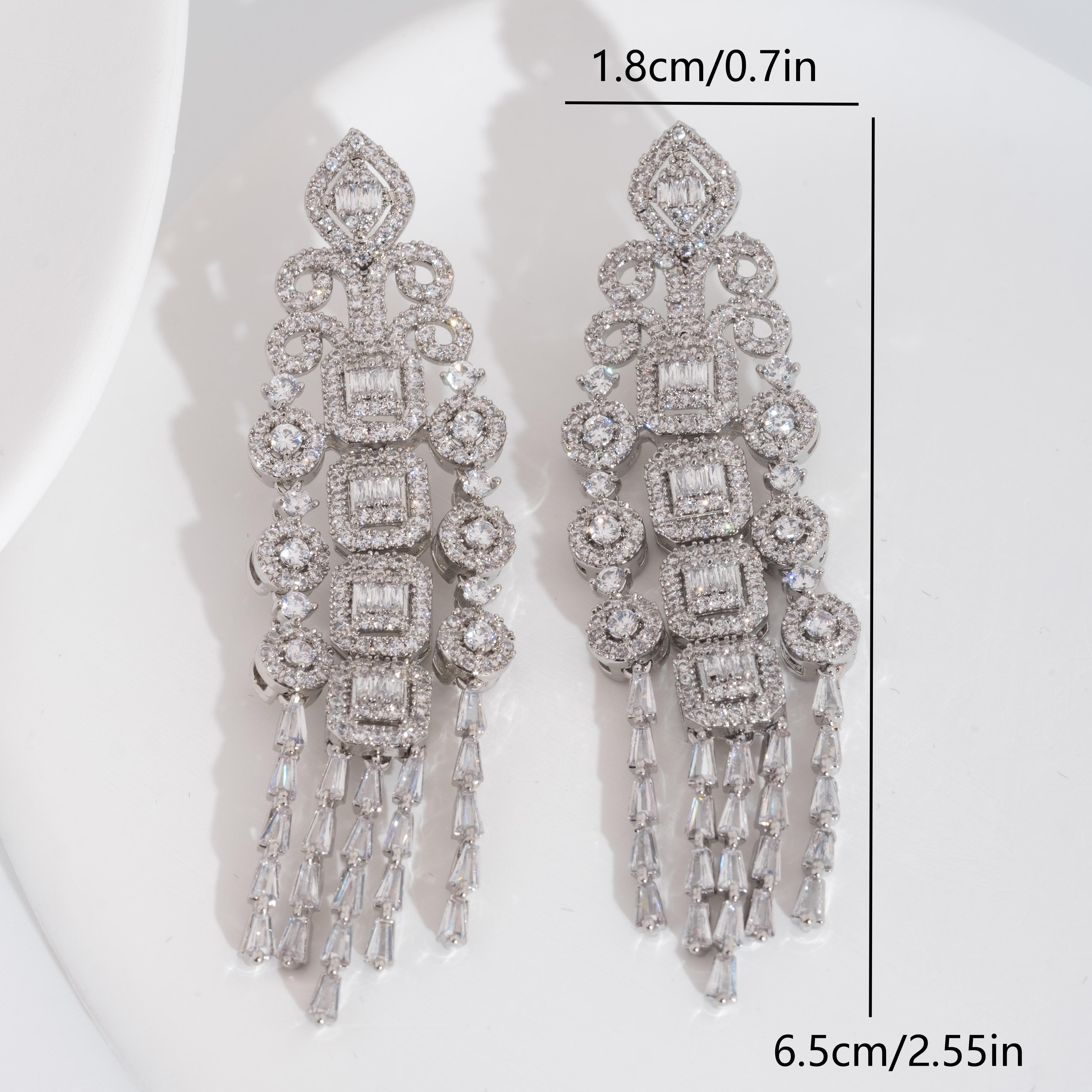 A set of luxurious and elegant earrings with a sparkling cubic zirconia pendant design is suitable for ladies to wear at weddings Item Picture