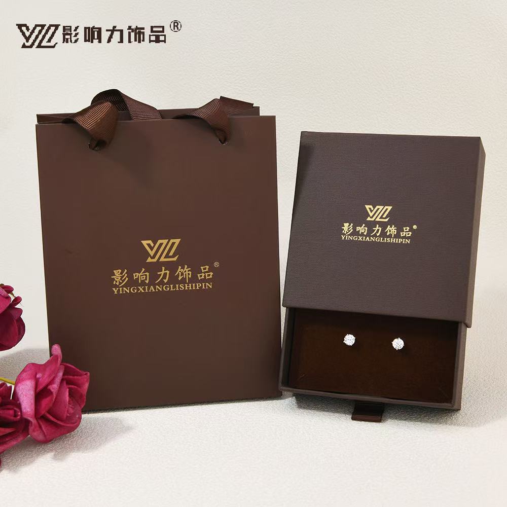 S925 sterling silver ear studs are popular for ear piercing. Round diamond silver ear stud earrings