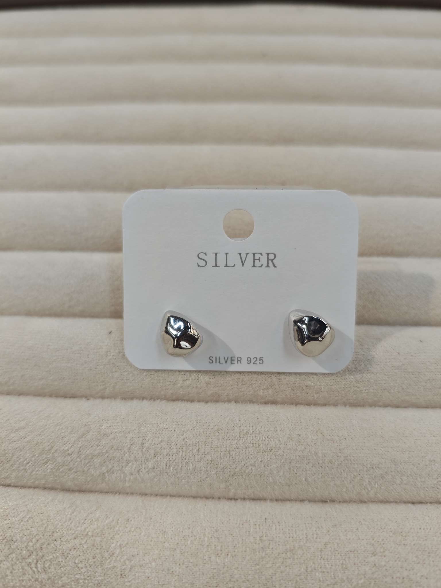 A pair of S925 sterling silver ear studs and needles for ear hole care accessories, fashionable and simple, with irregular water drop patterns detail image 6