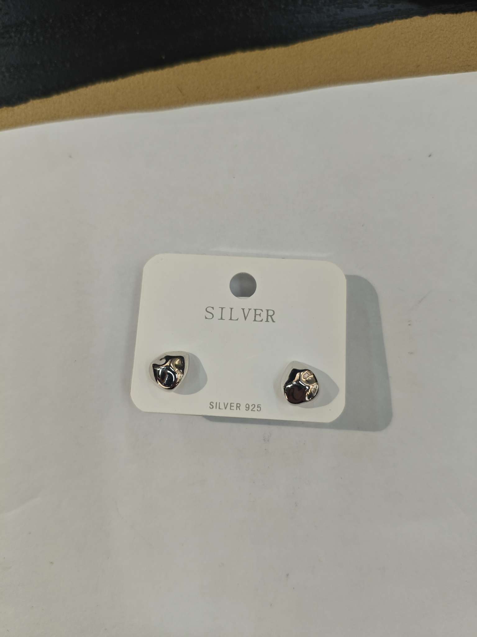 A pair of S925 sterling silver ear studs and needles for ear hole care accessories, fashionable and simple, with irregular water drop patterns detail image 5