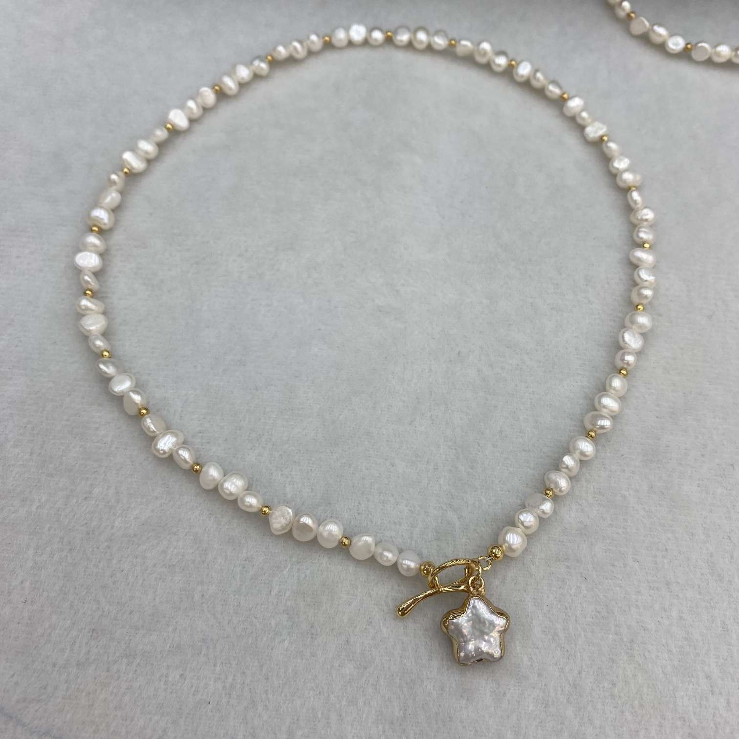 وقطع لؤلؤة اللؤلؤ الباروكي الطبيعي الجديدة 2026، وهي عبارة عن مكعبات فولاذية من الزمن Item Picture