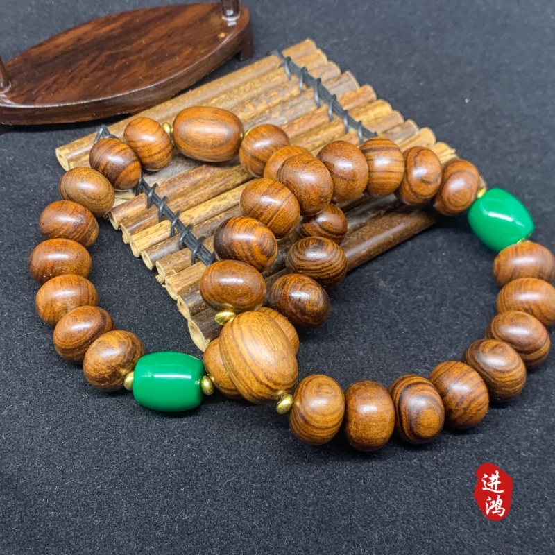 A black rosewood abacus bead bracelet is also available at wholesale price details Picture