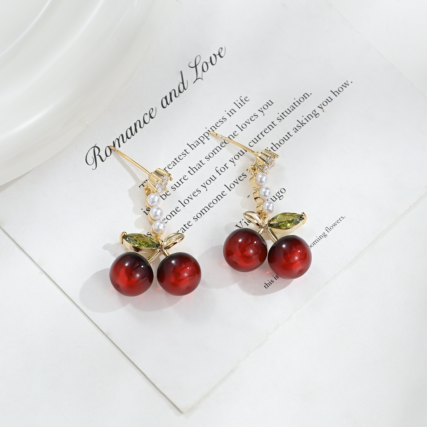 The new, niche and distinctive ear studs in a cherry shape are versatile for daily gatherings details Picture