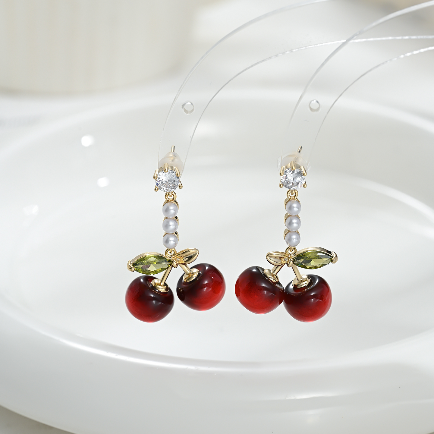 The new, niche and distinctive ear studs in a cherry shape are versatile for daily gatherings Application Scenario