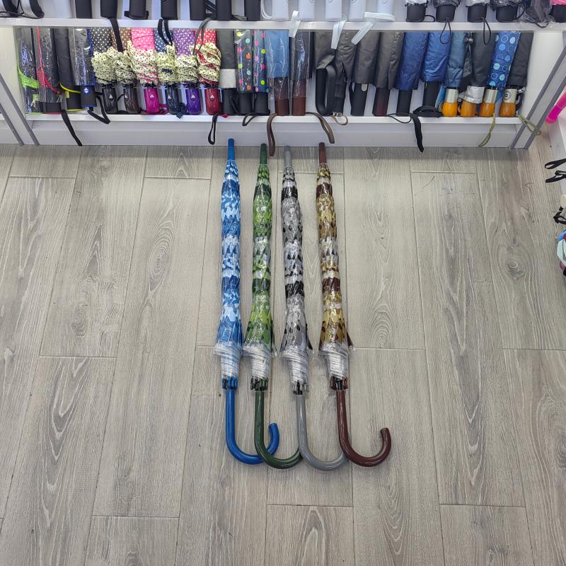 The Hengdun camouflage transparent straight-handled umbrella features a curved handle with anti-slip design and is reinforced for rain and wind. It has a long handle and is suitable for both men and women. It is a student and couple umbrella. It is a popular online celebrity with a high level of appearance. It is a windproof umbrella that supports wholesale and customization. lolg