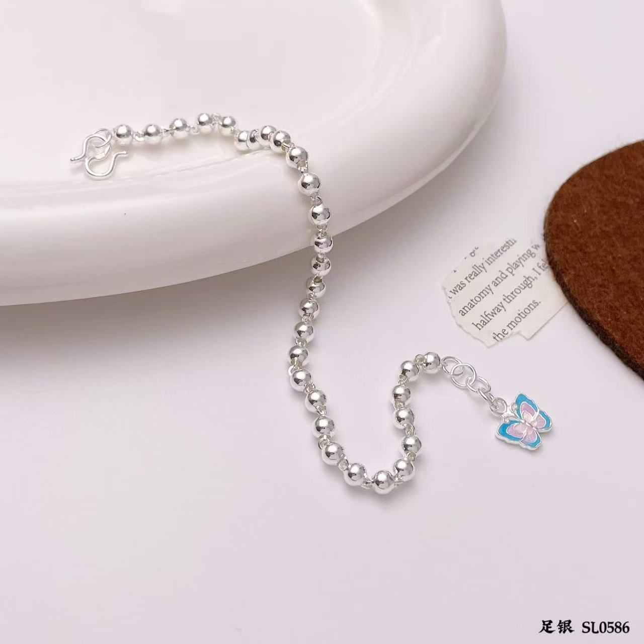 New jewelry, pure silver 990 pearl hanging resin butterfly silver bracelet Specification image