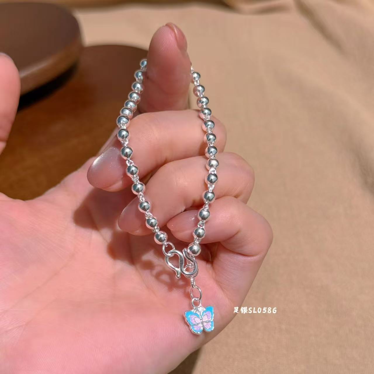 New jewelry, pure silver 990 pearl hanging resin butterfly silver bracelet Item Picture