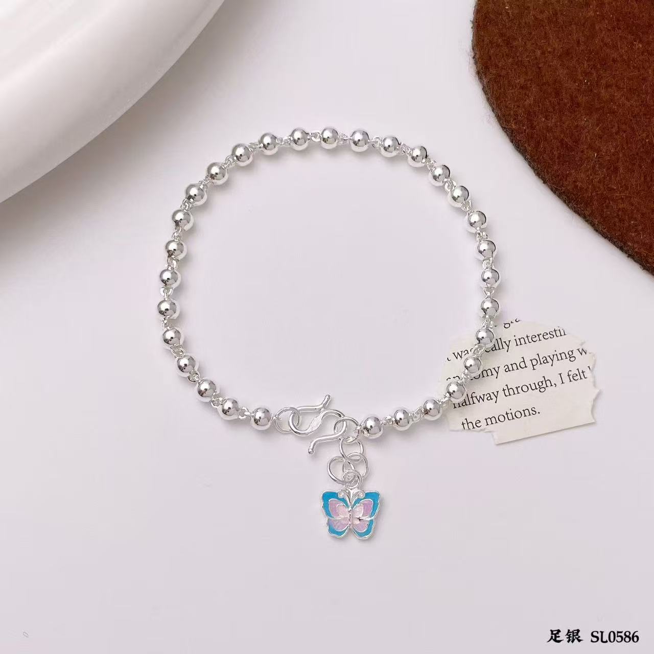 New jewelry, pure silver 990 pearl hanging resin butterfly silver bracelet Application Scenario