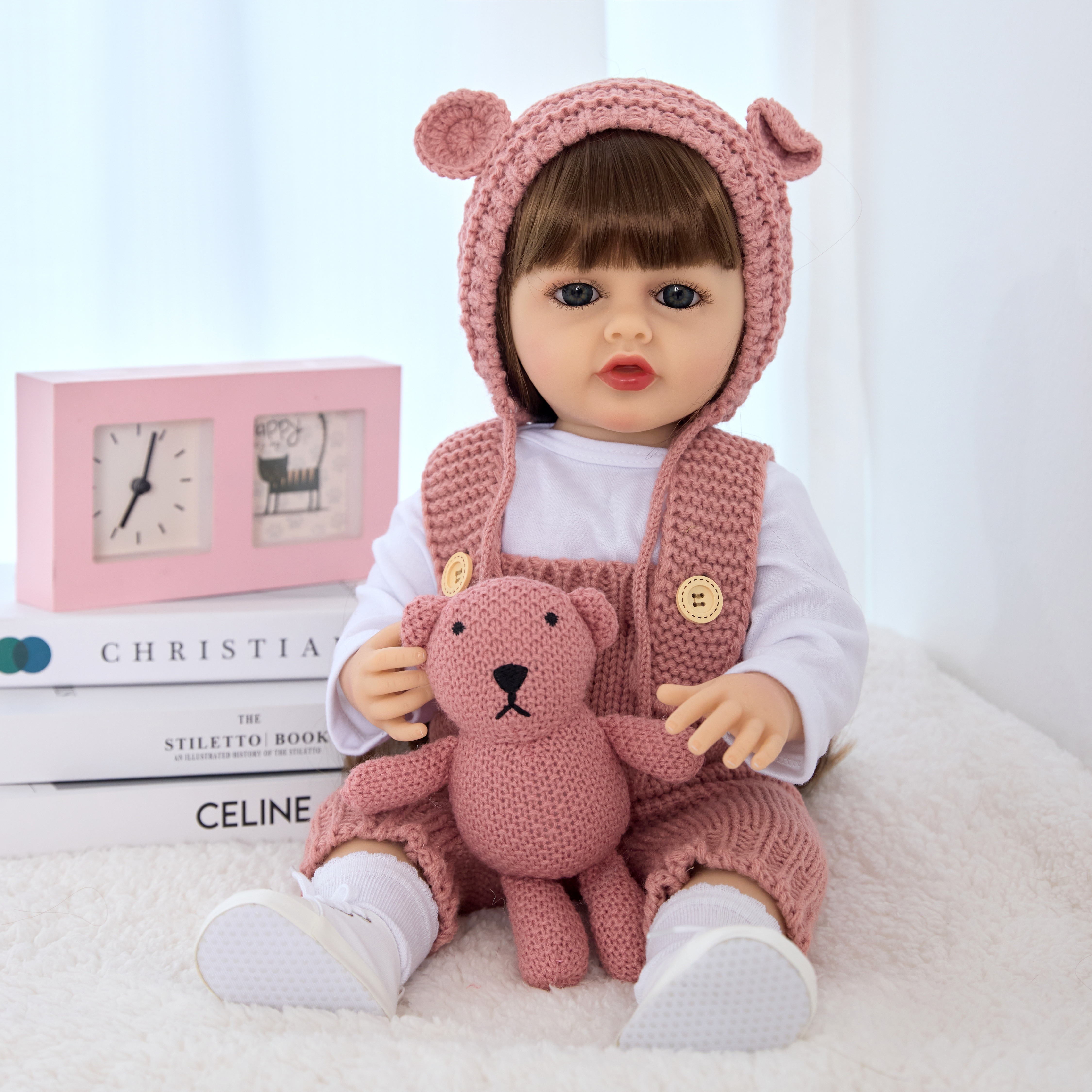 The 55-centimeter long-haired girl doll of the reborn baby, a washable simulation companion toy, is selling well across borders Specification image