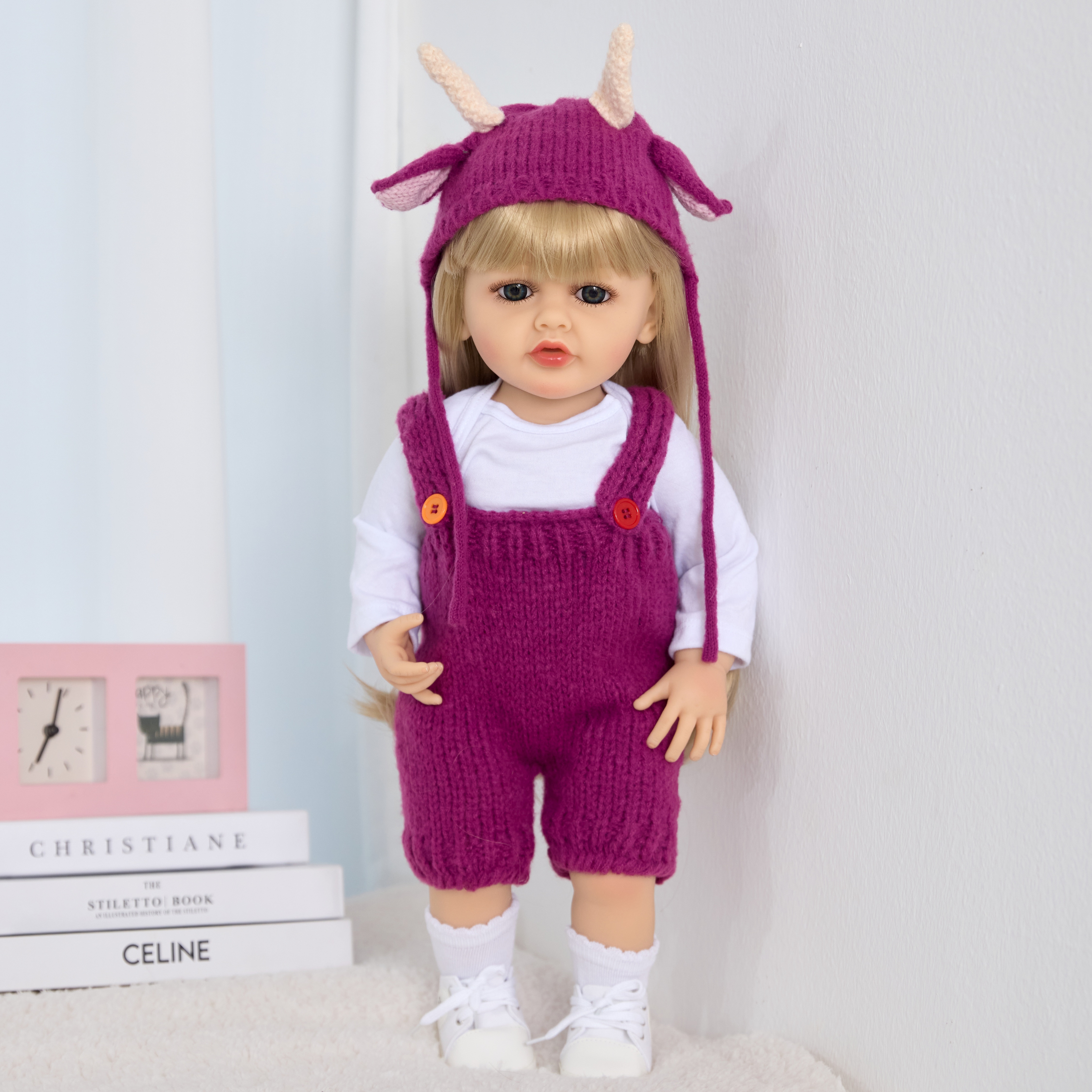 The 55-centimeter long-haired girl doll of the reborn baby, a washable simulation companion toy, is selling well across borders Item Picture