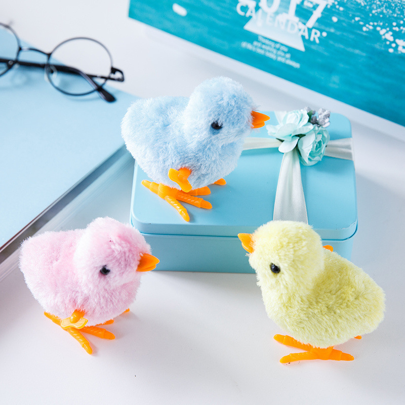 The wind-up chicken simulates a cute jumping chick. When it's wound up, it will run with a plush toy details Picture
