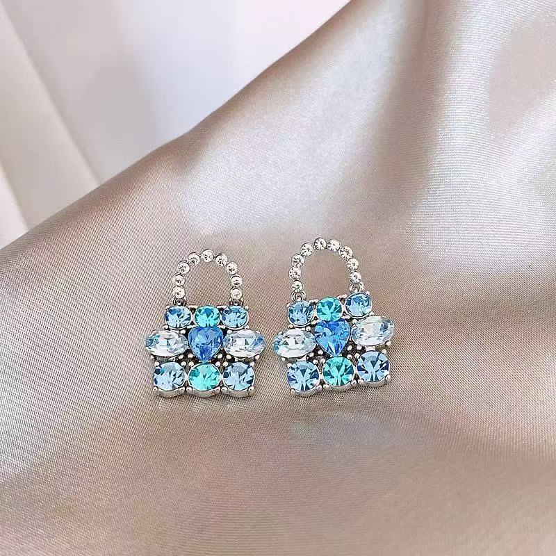 Light luxury, high-end and niche design, blue bag-shaped earrings, fashionable and elegant Application Scenario