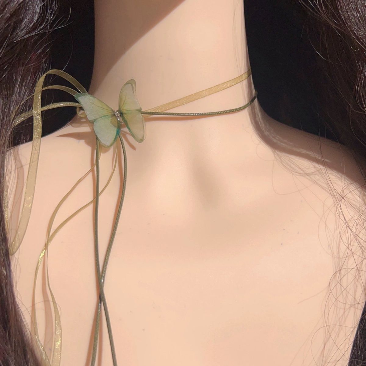 The choker is a unique and ethereal green chiffon butterfly long lace-up neckband with a chic look Specification image