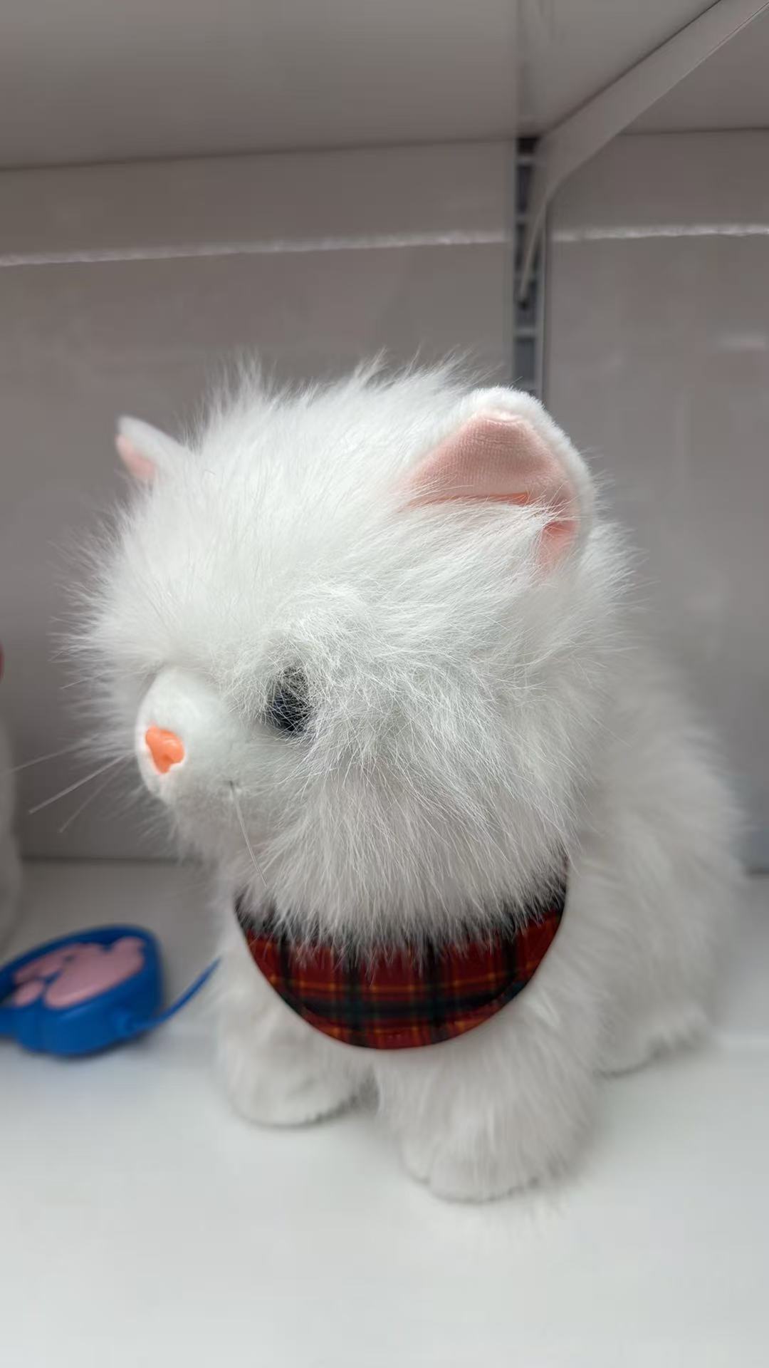 A cute and furry plush toy doll with a leash licking its tongue, walking and singing Specification image