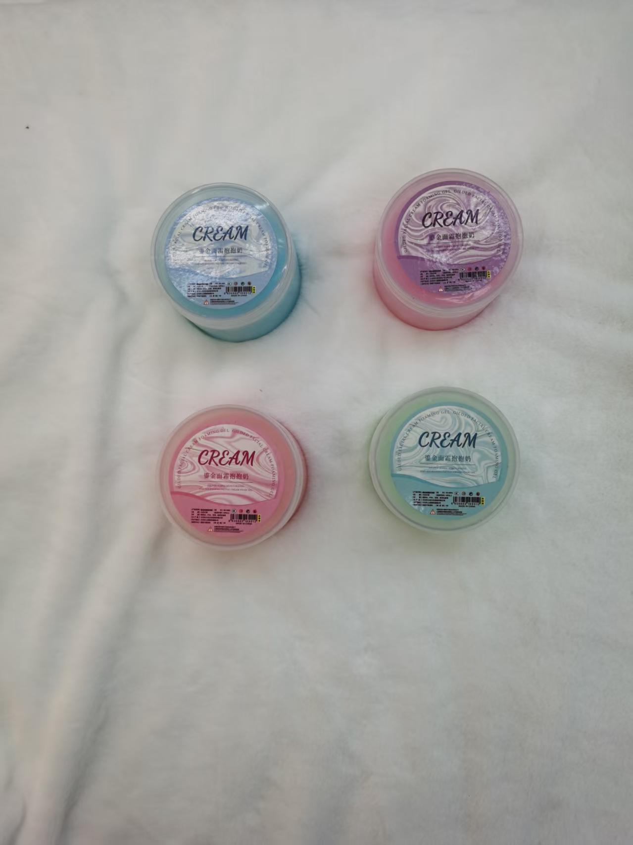 Gilded face cream, Hug milk, multiple cans of colorful round milk cream, relaxing and stress-relieving details Picture