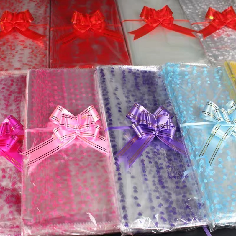 Colorful transparent PVC six-zone packaging bag with bow tie, PE flat bag for clothes, embossed vacuum bag