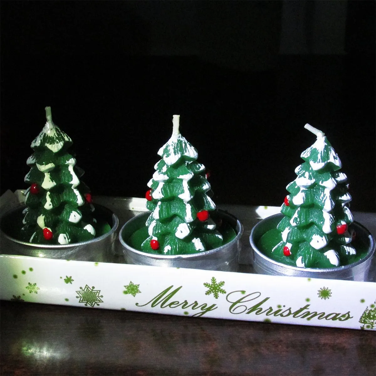 Romantic Christmas Eve gifts decorated with Christmas candles. Cute little aluminum shell-shaped candles for Christmas detail image 10