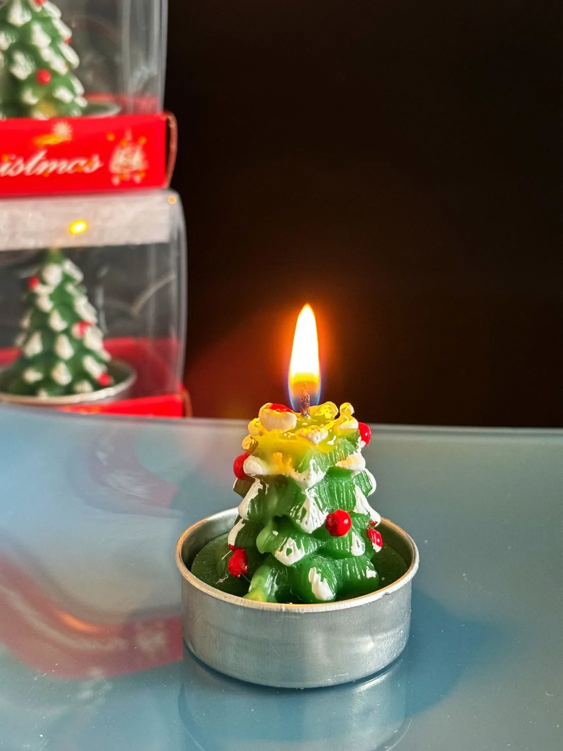 Romantic Christmas Eve gifts decorated with Christmas candles. Cute little aluminum shell-shaped candles for Christmas detail image 9