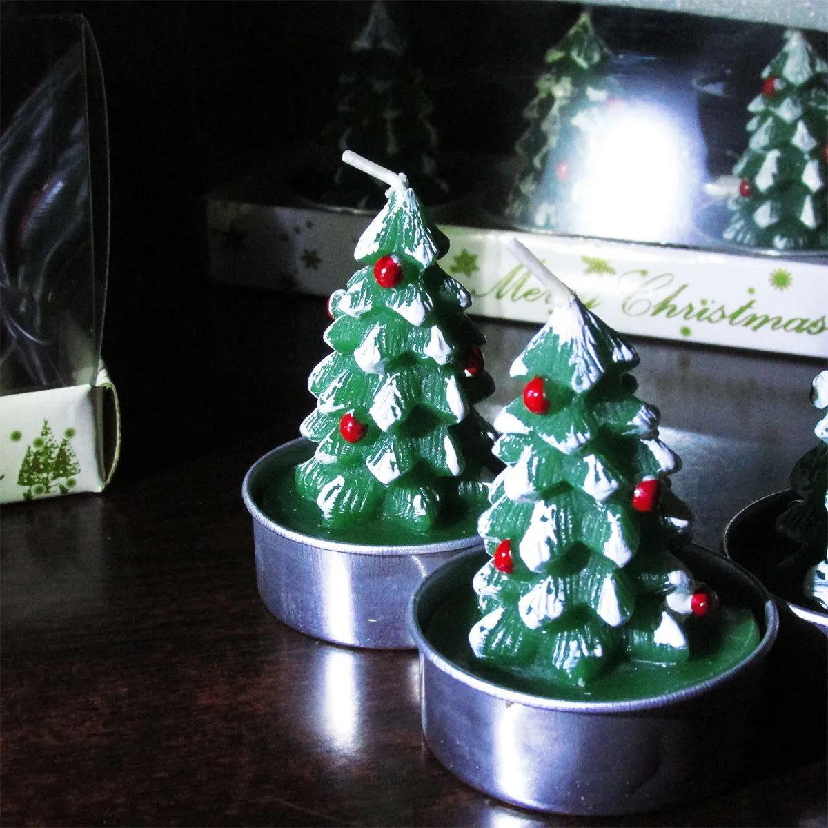 Romantic Christmas Eve gifts decorated with Christmas candles. Cute little aluminum shell-shaped candles for Christmas detail image 7