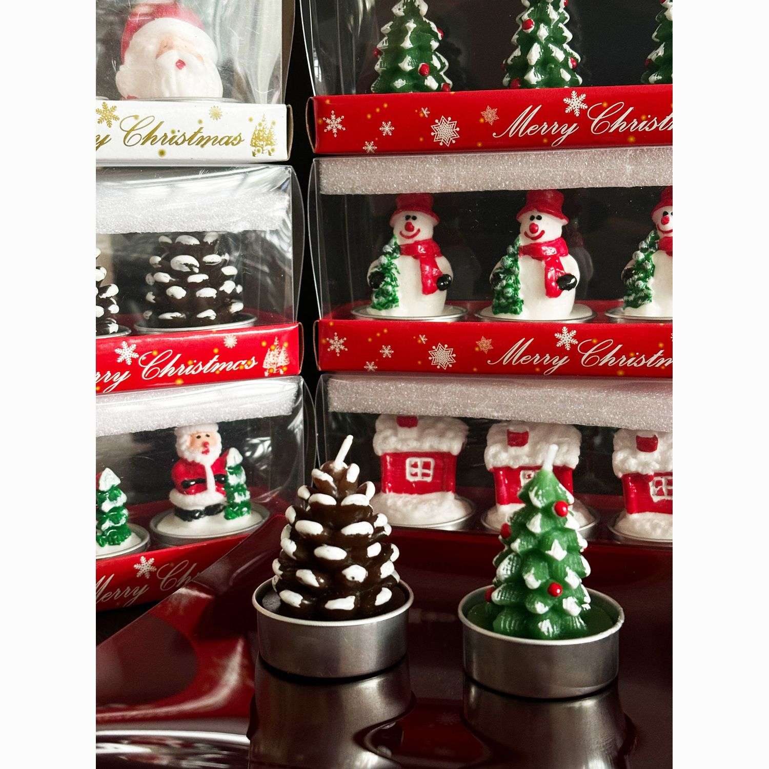 Romantic Christmas Eve gifts decorated with Christmas candles. Cute little aluminum shell-shaped candles for Christmas detail image 12