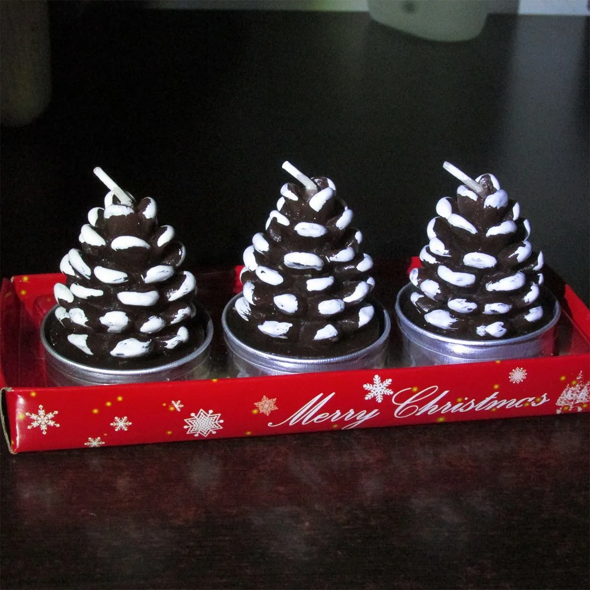 Romantic Christmas Eve gifts decorated with Christmas candles. Cute little aluminum shell-shaped candles for Christmas detail image 5